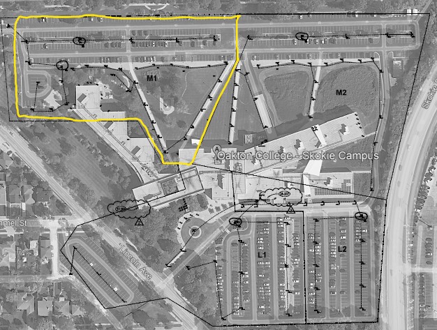 A satellite view of Oakton College's Mulford parking lot with an orange highlight around it to denote construction.