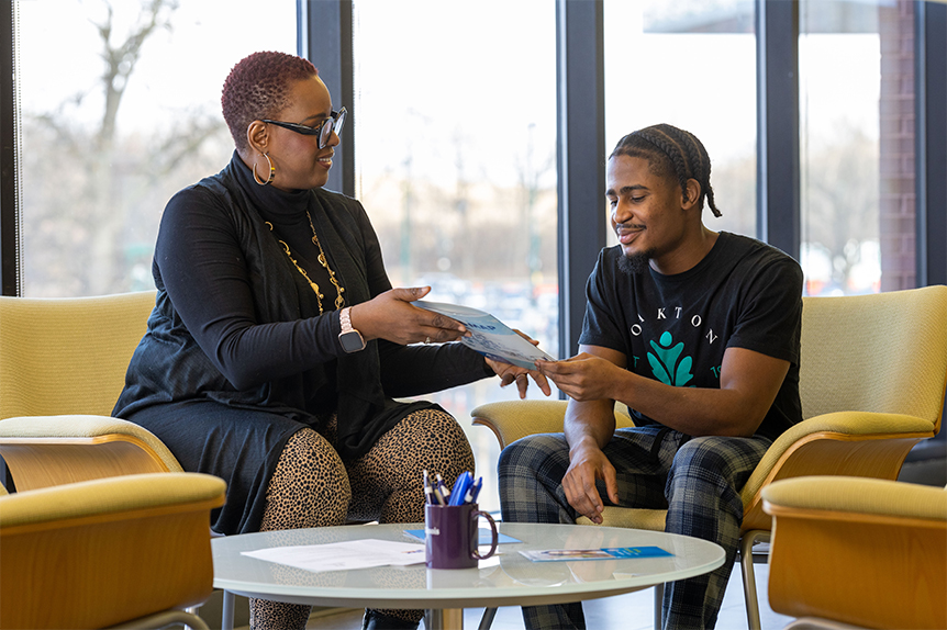 A student seeks support from an Oakton counselor