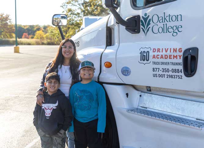 An image of Amayrani Vargas and her kids in front of the CDL truck.